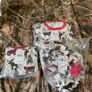 Lot of brand new Christmas pajamas 2- adult 2x and 1 kids 6